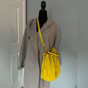 Marc by Marc Jacobs 2 way drawstring leather bag in yellow colour